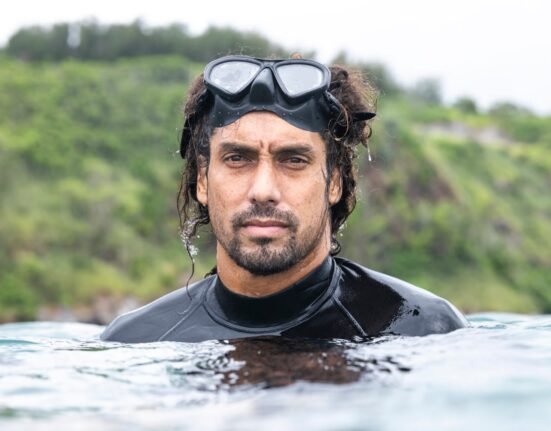He rides world class waves. He also studies what keeps them alive.