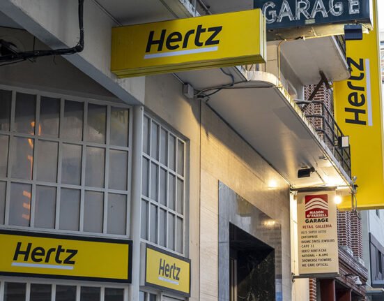 Hertz shares fall after debt plan and profit warning