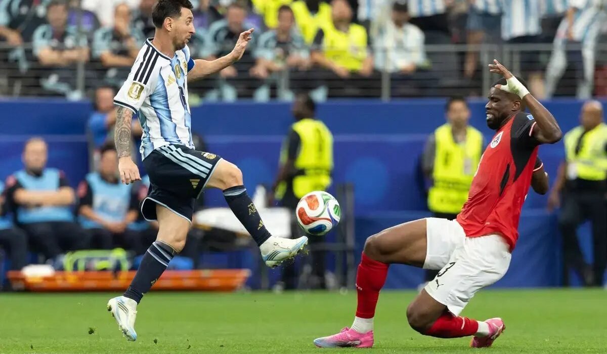 Lionel Messi's record-breaking masterclass seals Argentina's World Cup group victory