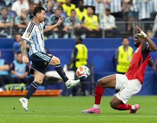 Lionel Messi's record-breaking masterclass seals Argentina's World Cup group victory