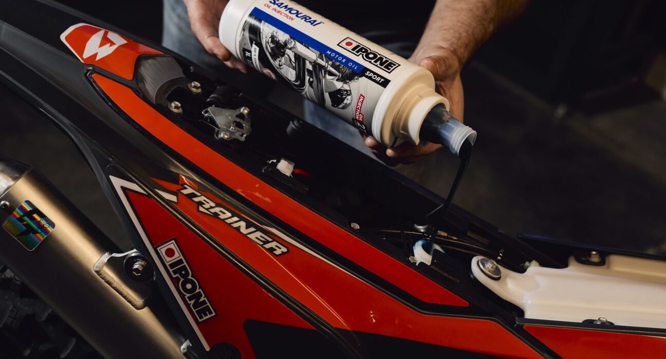 Two-stroke engines for high performance, low smoke and maximum safety