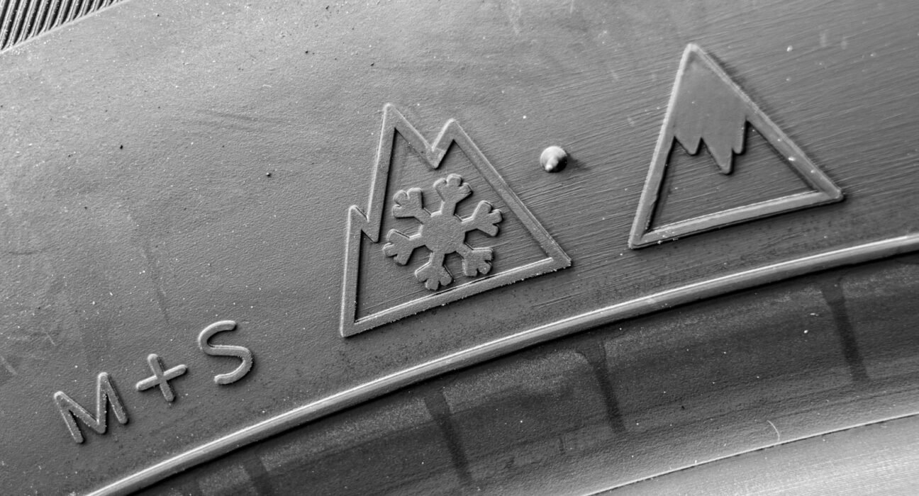 What does that little mountain symbol on some tires mean, and what did they have to do to get it