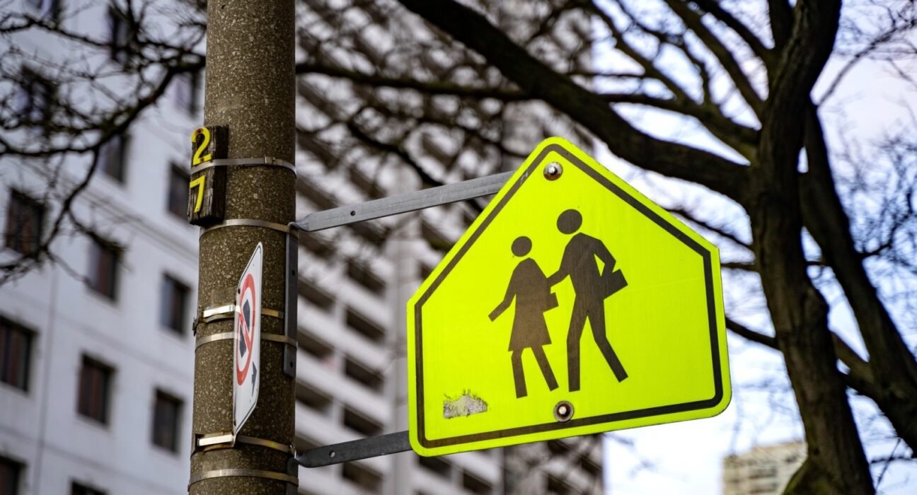 Why do school zone signs use that distinctive loud, bright, fluorescent yellow-green color