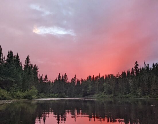 Forest Service closes border waters as wildfire spreads