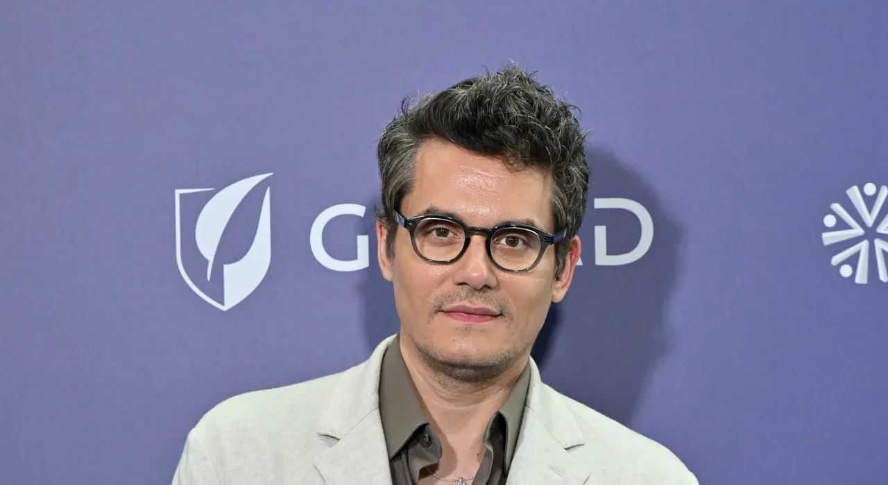 John Mayer channels young Eric Clapton in breezy summer blazer