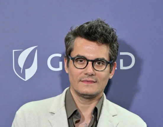 John Mayer channels young Eric Clapton in breezy summer blazer