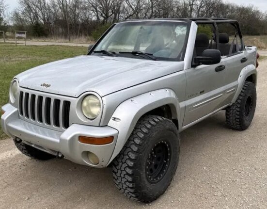 Pursue life and happiness with this chopped-top Jeep Liberty for beater car money
