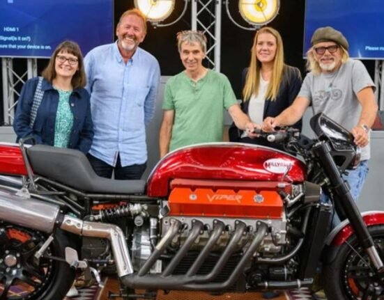 Thank God, the guy who just won that Viper V10 custom motorcycle plans to ride it