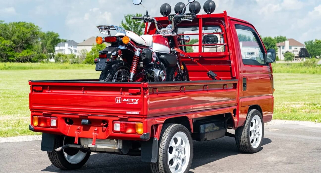 This Honda Kei truck comes with a mini moto monkey on its back. it's perfect