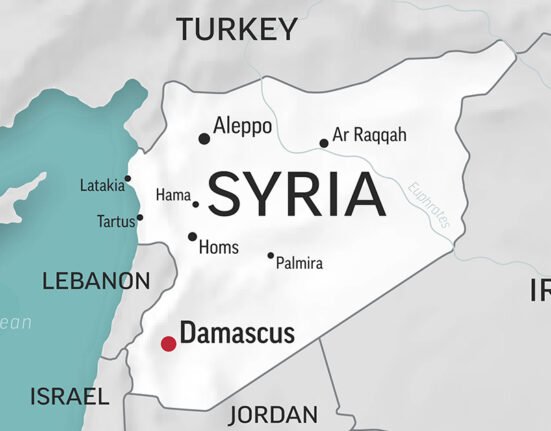 Thousands of trucks carry Iraq's oil through Syria