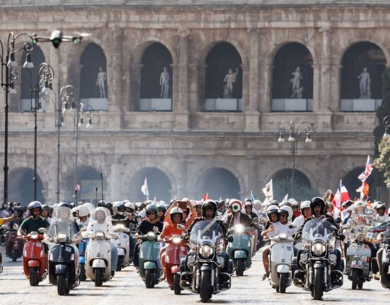 Thousands rally in Rome on two wheels to mark Vespa's 80th anniversary