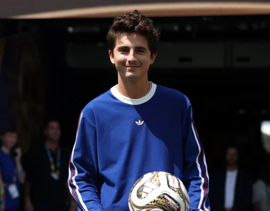 Timothée Chalamet takes out a new Adidas Samba at the World Cup Final