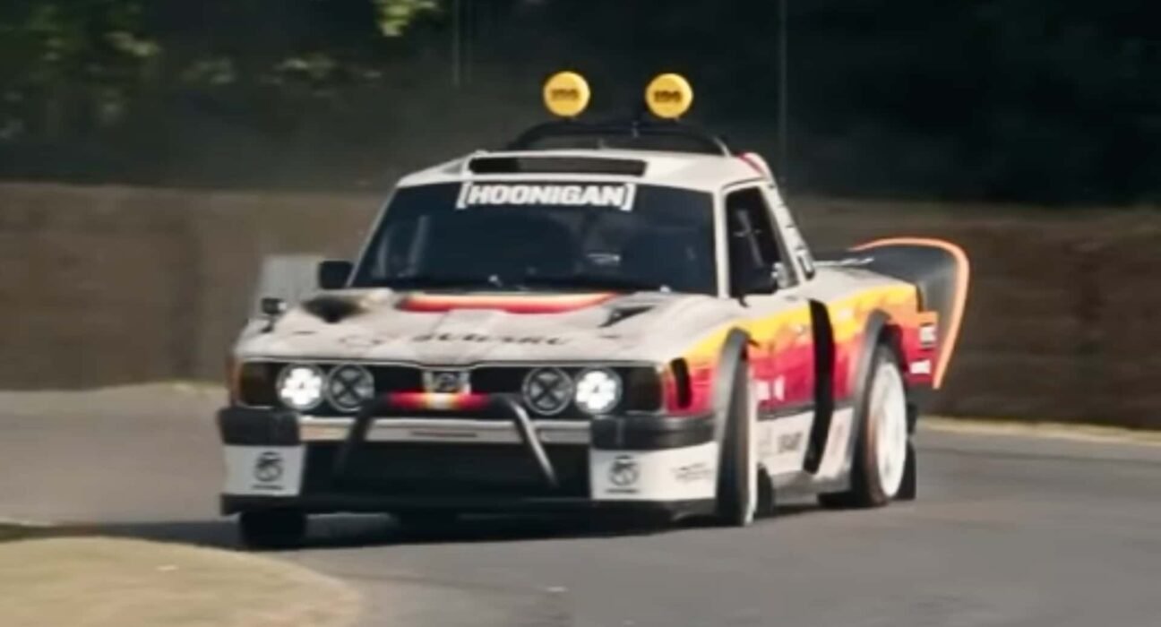 Travis Pastrana makes his way up the Goodwood Hill climb in his 670-hp custom Subaru