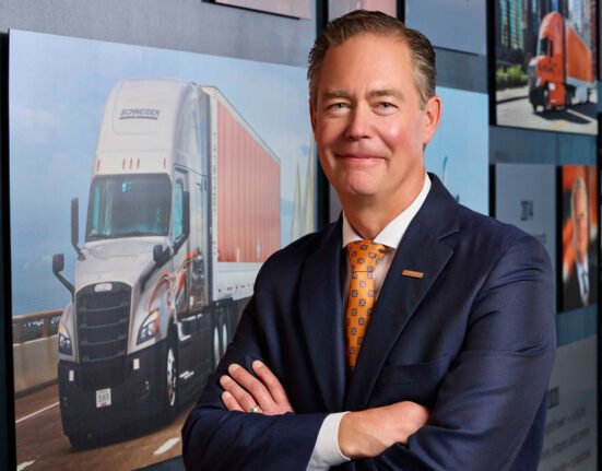 Wisconsin native Jim Filter drives in Schneider